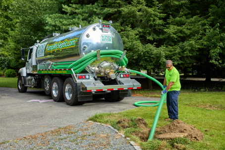 septic pumping services using a pumper truck