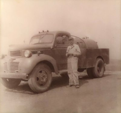 Historical image of Hapchuck owner with his truck. 